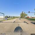 Officer contacts driver of black Nissan at junction