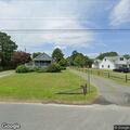 person with general illness at intersection in chincoteague