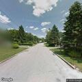 Officer checks white Volkswagen on Quaker Road