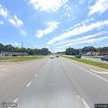Traffic stop on white Nissan Versa