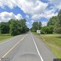 Vehicle crash with dead deer on Madison Road