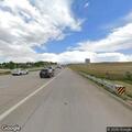 Traffic stop on white Toyota Tacoma at Lincoln exit