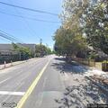 Complaint about person sleeping outside business near Oak Grove Ave