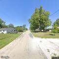 Man in blue sedan found bleeding from head