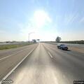 Disabled SUV with flat tire on Highway 99
