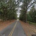 Partially fallen tree endangering Fleetwood Road