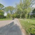 Neighbor burning trash with plastic in Okemos
