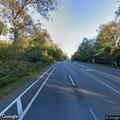 Lightning-damaged tree blocks northbound traffic lane
