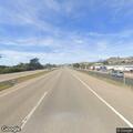 Pedestrian stepping into slow lane on Highway 1
