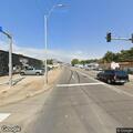 Traffic stop on black sedan with no license plate