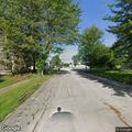 Person experiencing abdominal pain near Perry Street