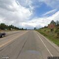 Car hits elk and blocks lane on Highway 24