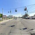 Person standing in roadway at S 16th St and W Montauk Hwy