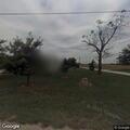 Traffic stop on gray Chevy pickup at exit ramp