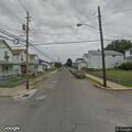 Vehicle hits utility pole, wire falls onto house