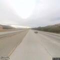 Car straddling lanes on I-5 near Lebec
