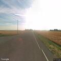 Broken utility pole off roadway on Road 70