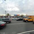 Woman having difficulty breathing at gas station