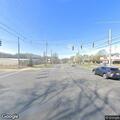 Officer checks silver Chevy Malibu at intersection