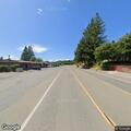 Trash reported falling from pickup on Redwood Drive