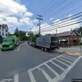 Disabled vehicle blocking traffic at intersection