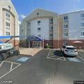 Man with abdominal pain at Candlewood Suites in Salina