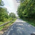 Vehicle hits caller and flees near Old Rosman Highway