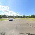 Pedestrian walking near traffic lane on Highway 23