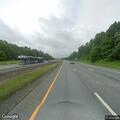 Vehicle reported off I-90 into roadside ravine