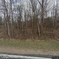 Person with nosebleed at gas station in Long Lake