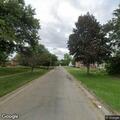 Dead deer blocking Elm Street roadway