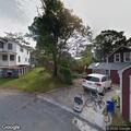 Officer checks vehicle in driveway on Cameron St