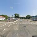Truck knocks down stop sign at intersection