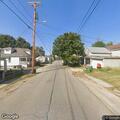 Person having difficulty breathing near High Street