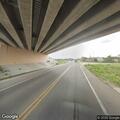 Man found lying in ditch along highway frontage road