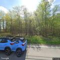 Car on fire in woods on State Route 534