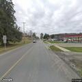 Downed power lines blocking road after car strike