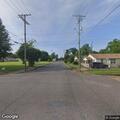 Person with breathing problem near Harris Court, Alexandria
