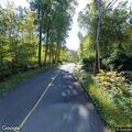 Tree down with small roadside fire on Short Woods Rd