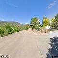 Traffic stop on blue Ford Escape in Manitou Springs