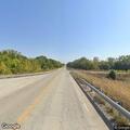 Pedestrian walking in roadway near Butler