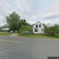 Officer checks house with open door in Wendell
