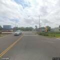 Railroad crossing arms stuck down at intersection