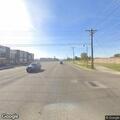 Person in red jumpsuit crying near road raises concern
