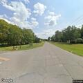 Intoxicated driver in white minivan reported on roadway