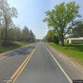 Car out of gas partially blocking Highway 25