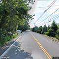 Racing car crashes off Route 1 near Walnut Street