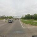 White minivan broken down with male occupant in question