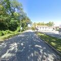 Elderly man unresponsive but breathing at business