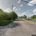 Car hits light pole; one person injured